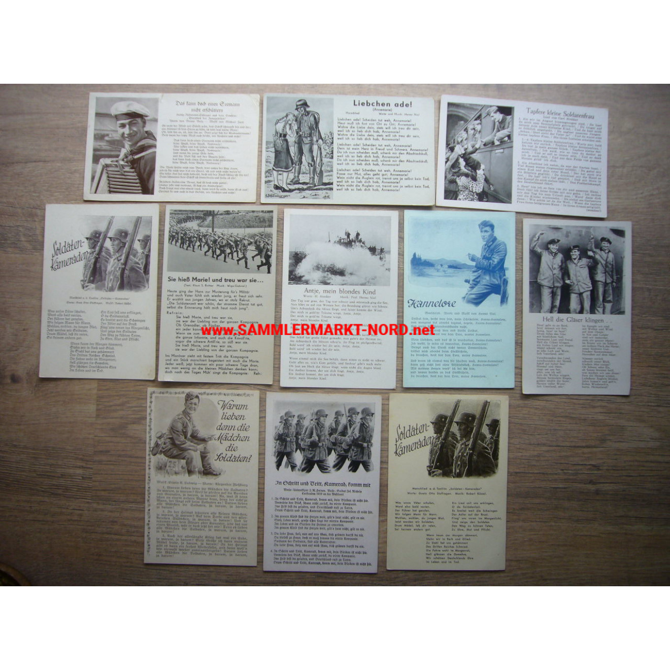 Convolute of military song postcards