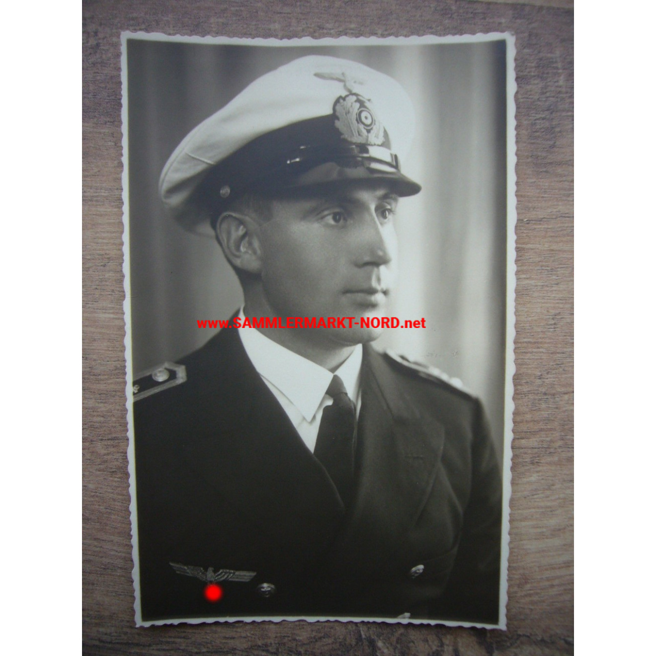 Kriegsmarine officer with white summer visor cap