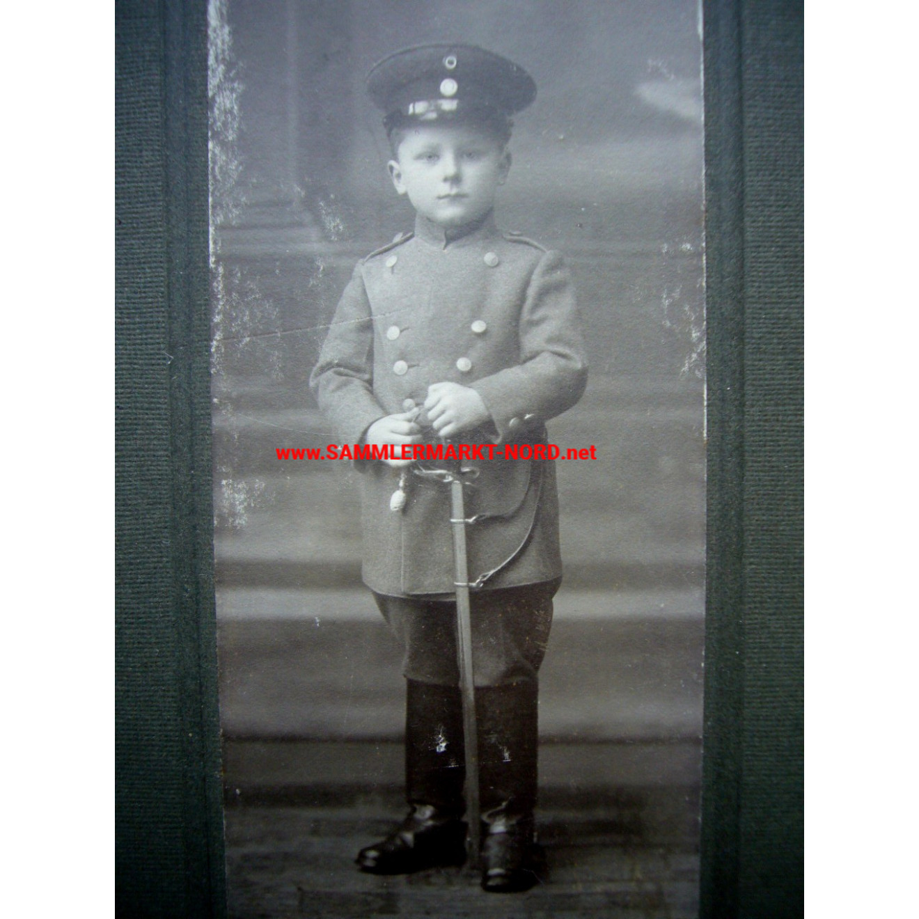 Cabinet photo - Child in uniform with sabre