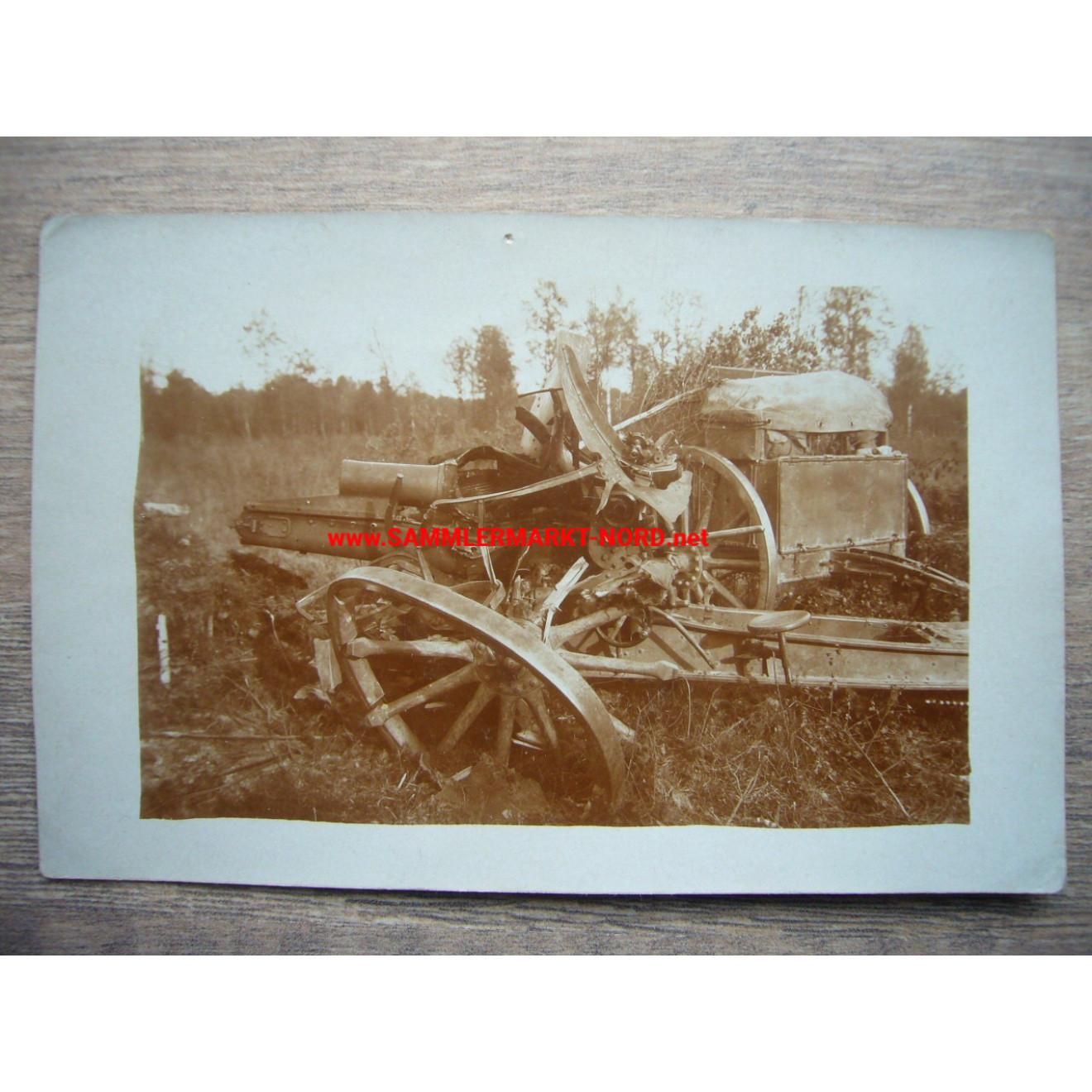 Photo - destroyed field gun and ammunition cart