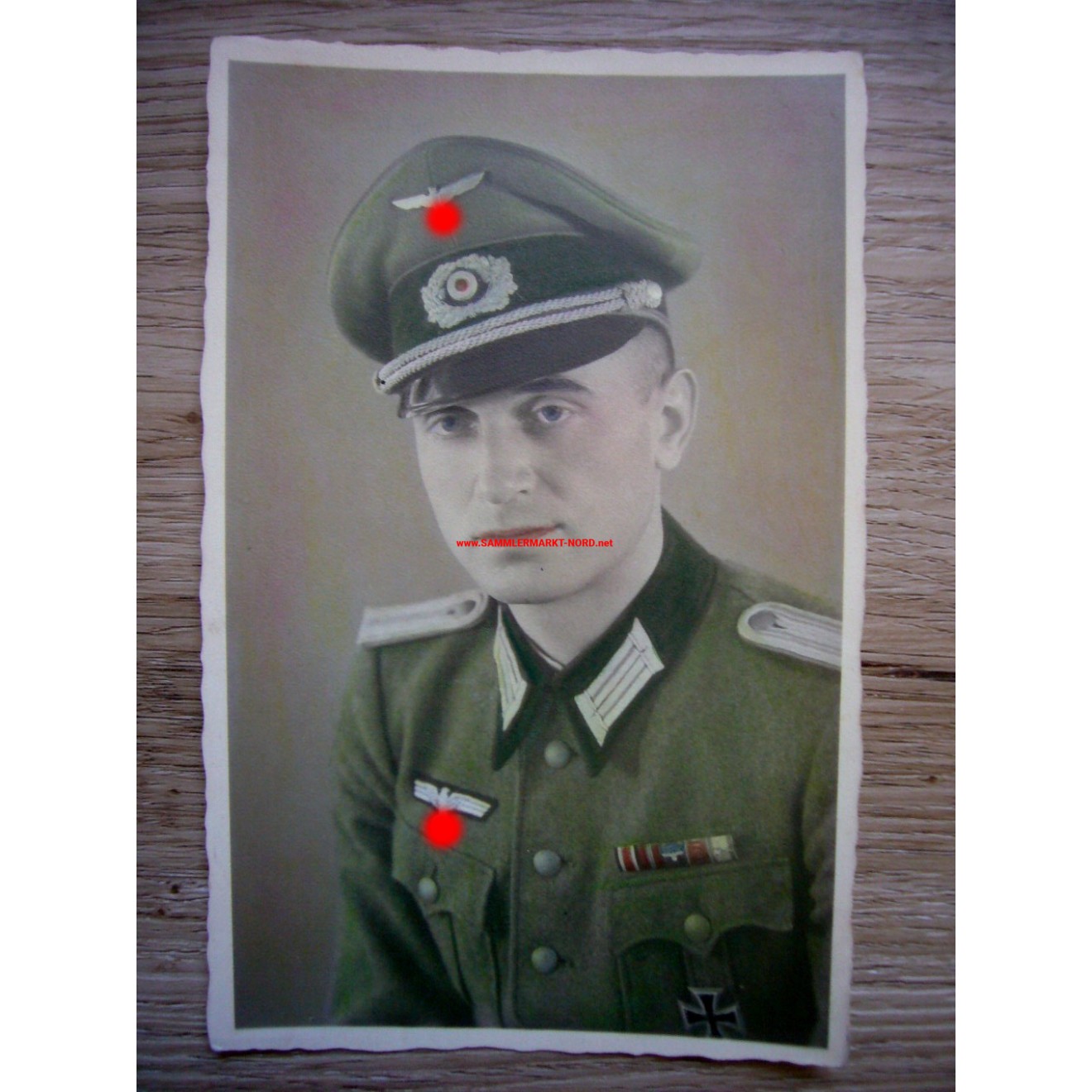 Wehrmacht lieutenant with visor cap, field clasp and Iron Cross 1st ...