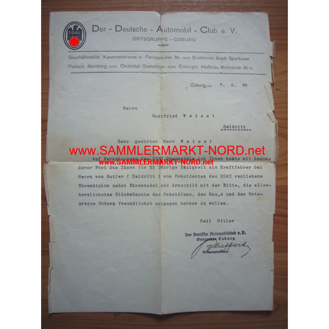 D.D.A.C. - Award of Honorary Diploma, lapel pin and Armshield