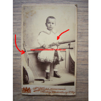 Cabinet photo - small child with rifle and saber