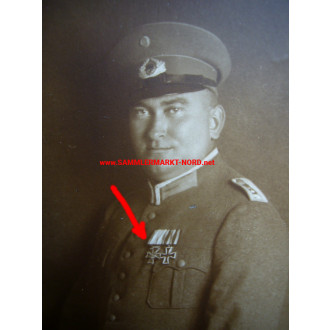 Reichswehr officer with saber and medal bar