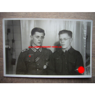Wehrmacht Hauptwachtmeister and HJ Flak helper
