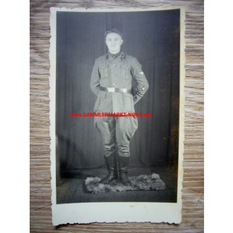 NSKK man with cuff title "NSKK Transport Regiment"