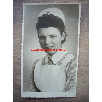 DRK Red Cross - Nurse with cap and service brooch