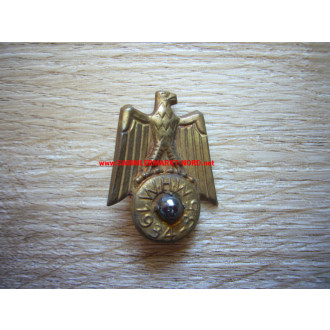 WHW 1934/35 - Eagle with ball - tin badge