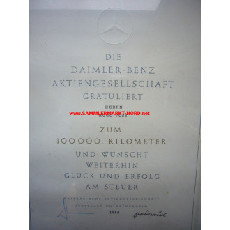 Mercedes Benz - 100,000 km certificate and needle