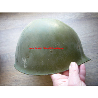 US Army steel helmet with rough camouflage